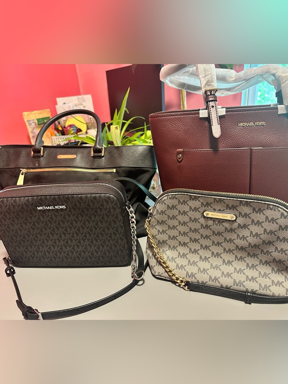 Bundle of 4 Michael Kors bags: NWT and used